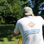 surveyor measuring distance